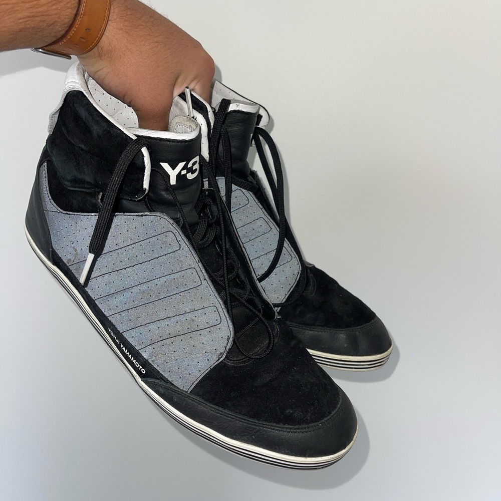 Y-3 reflective high top sneakers.